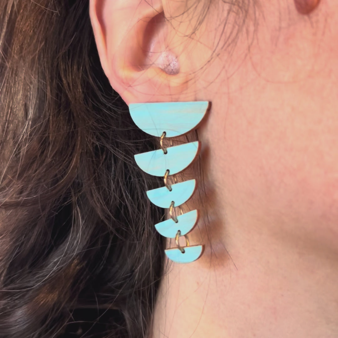 kinetic earrings in motion